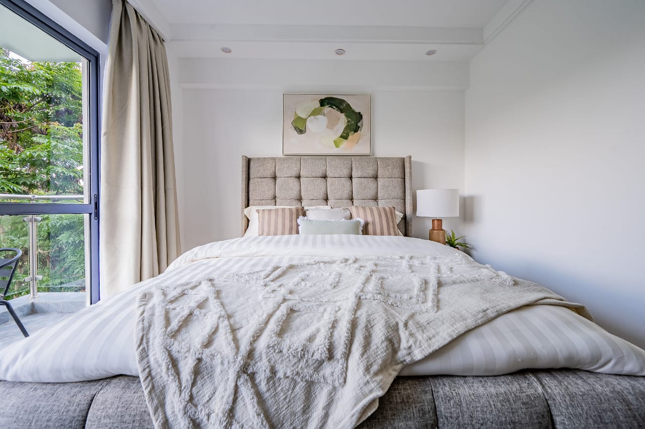 Bedroom with stylish decor in Riverside Nairobi apartment