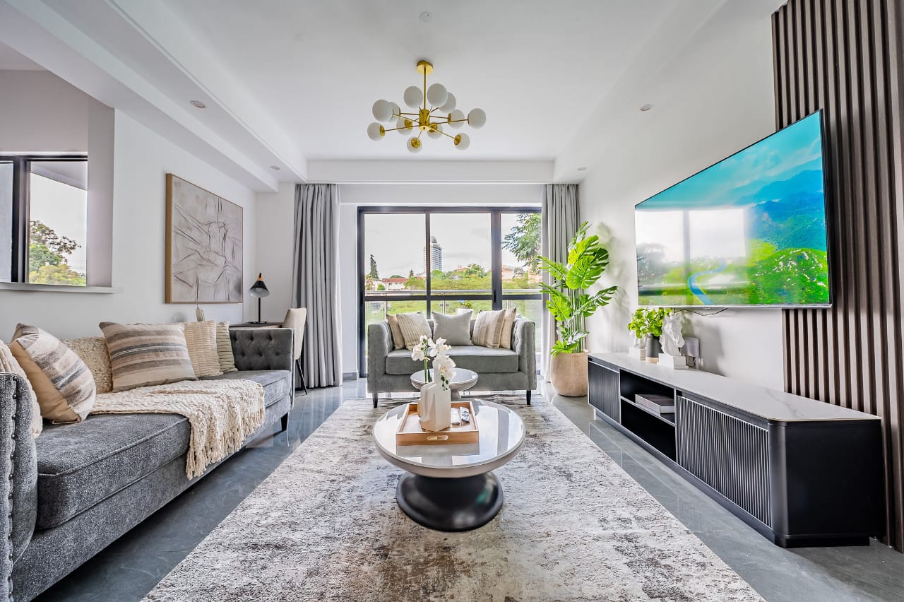 Balcony with outdoor seating in Riverside Nairobi apartment