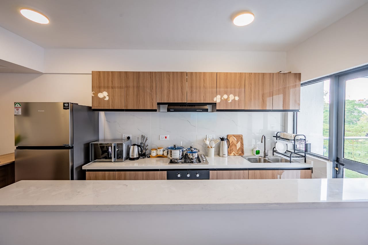 Spacious living room with modern furniture in Riverside Nairobi apartment